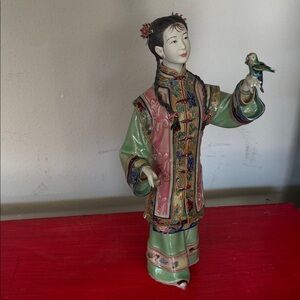 Elegant Ceramic Figurine with Bird